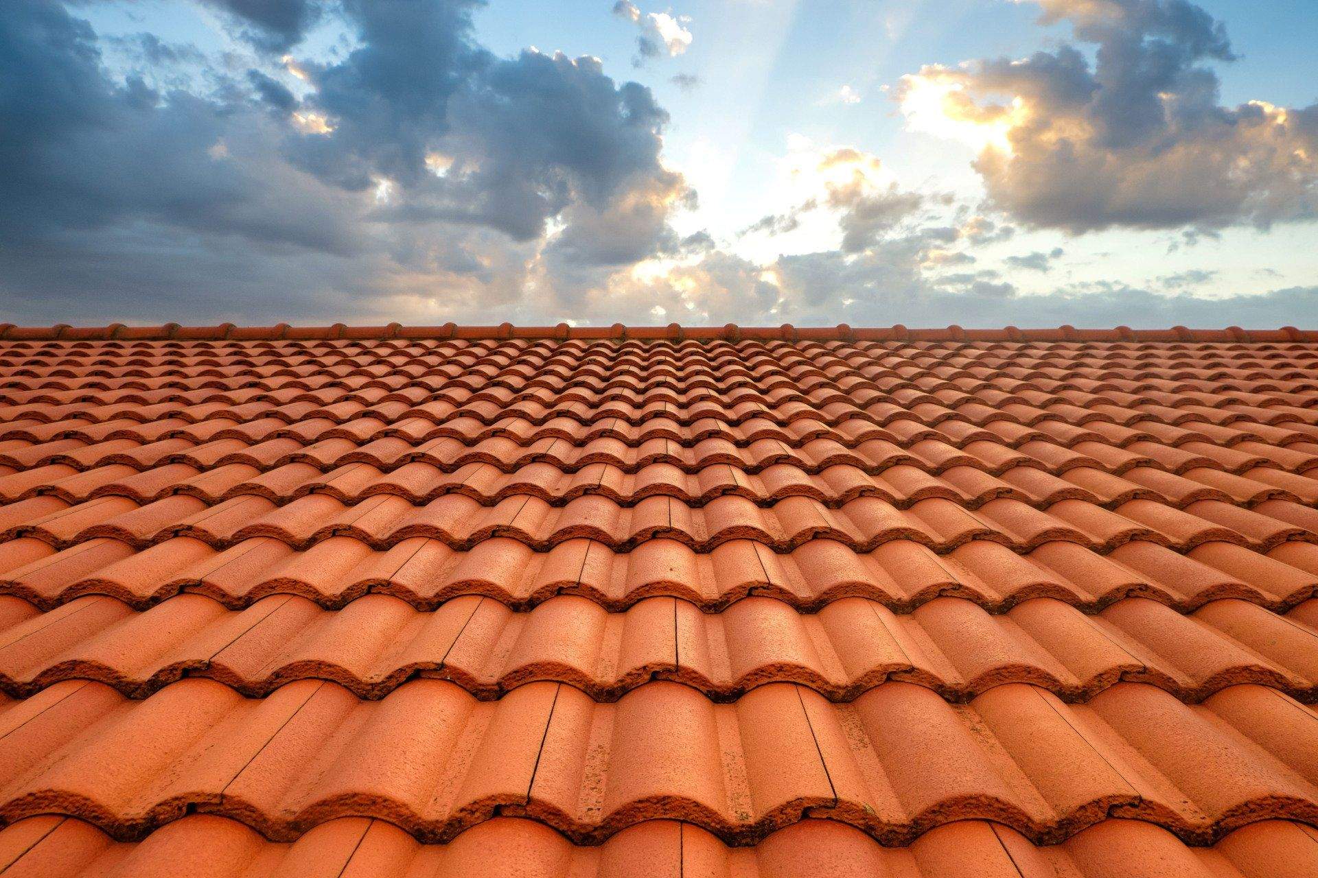 How a Tile Roofer Can Help You Reduce Your Energy Bills